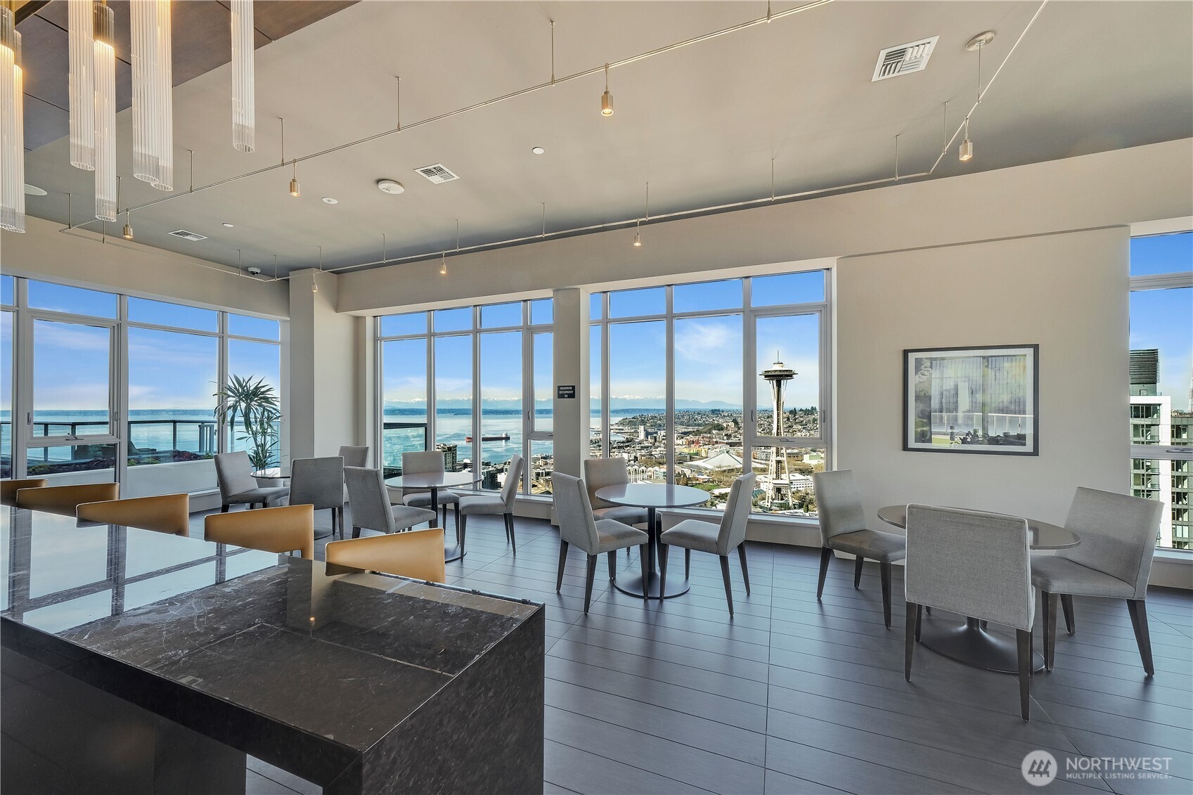 583 Battery Street, Unit 704N Seattle, WA 98121 - Photo 35 of 36 a view of a dining room with furniture window and outside view
