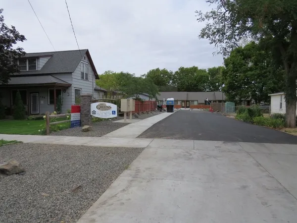 a car parked in front of a house