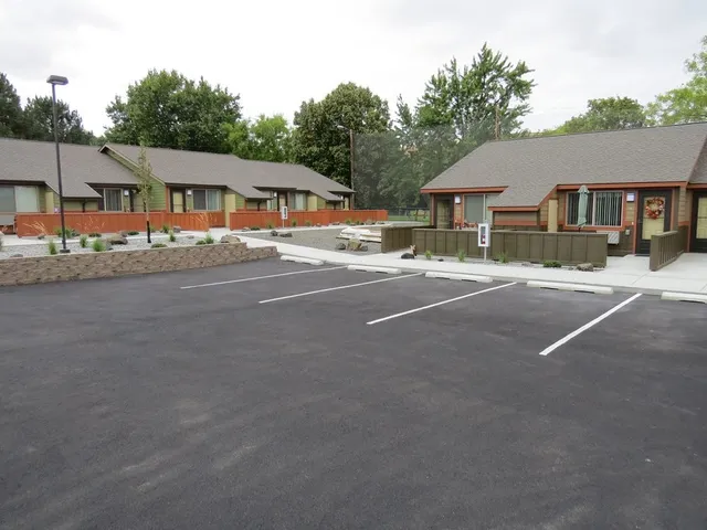 a view of a house with a street
