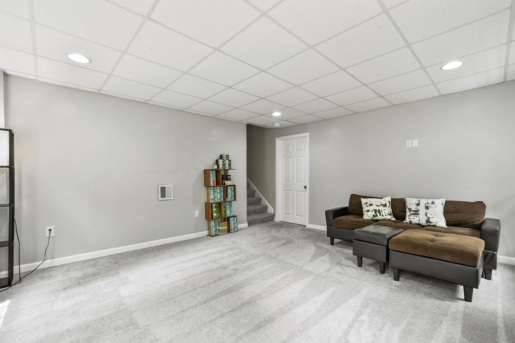 305 North Main Street Raynham, MA 02767 - Photo 25 of 38 a view of a room with furniture and a ceiling fan