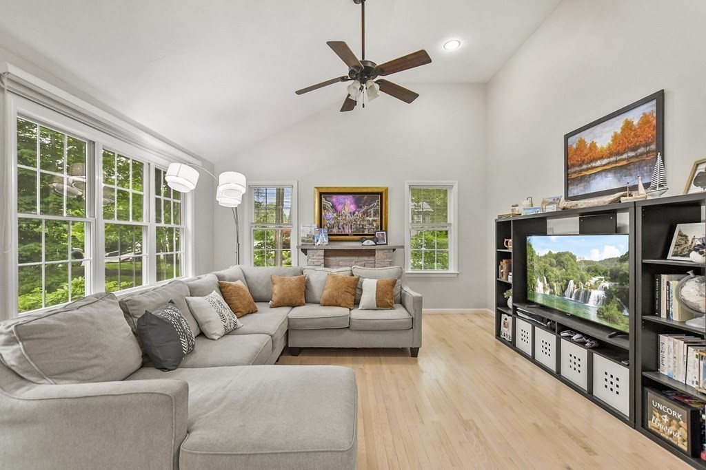 305 North Main Street Raynham, MA 02767 - Photo 3 of 38 a living room with furniture and a flat screen tv