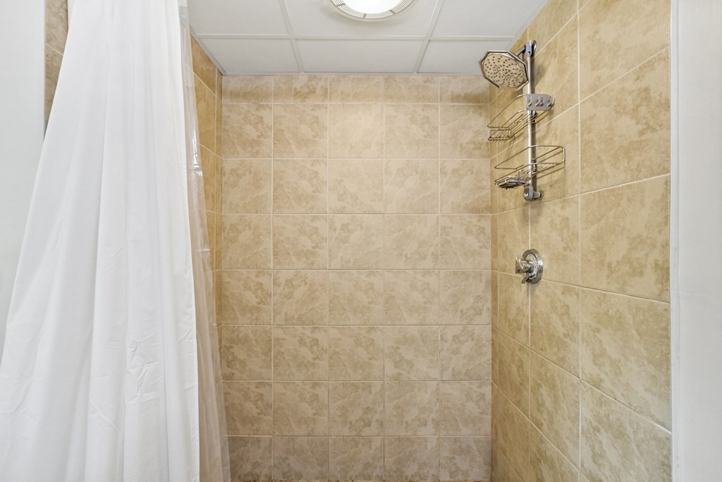 305 North Main Street Raynham, MA 02767 - Photo 31 of 38 a bathroom with a shower
