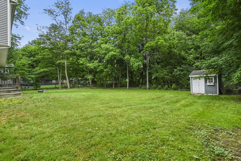 305 North Main Street Raynham, MA 02767 - Photo 36 of 38 a view of a house with a backyard