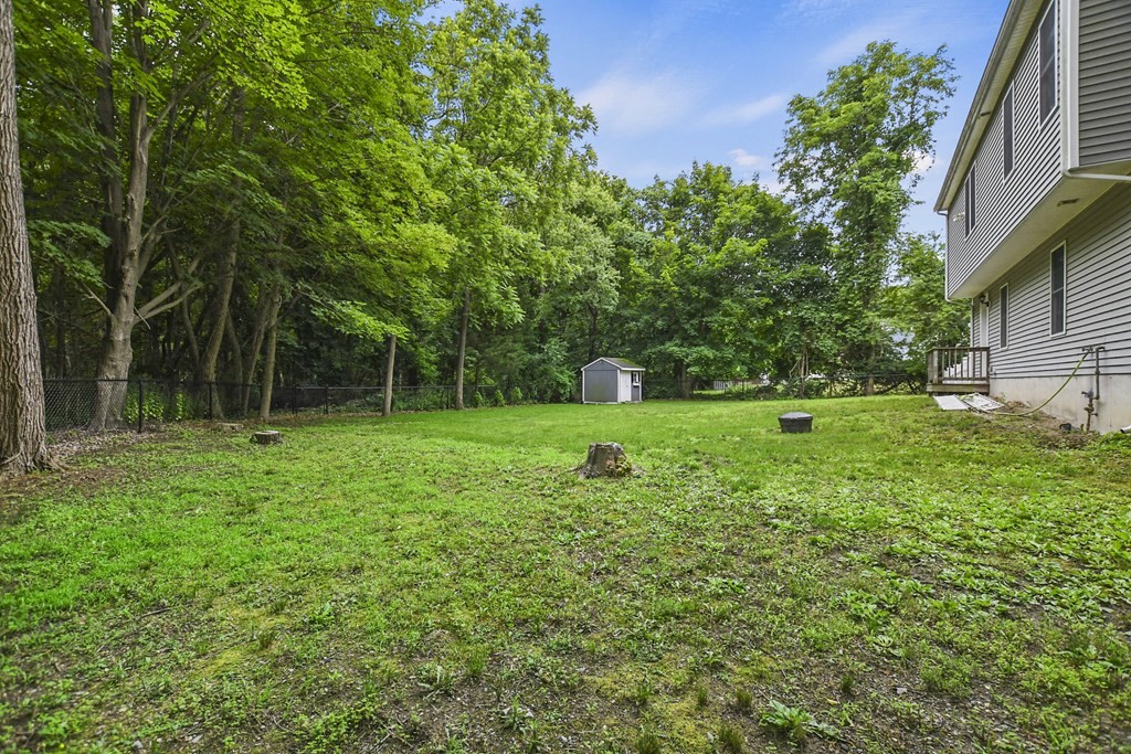 305 North Main Street Raynham, MA 02767 - Photo 37 of 38 a view of a garden with a tree