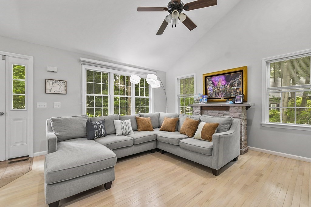 305 North Main Street Raynham, MA 02767 - Photo 5 of 38 a living room with furniture and a flat screen tv