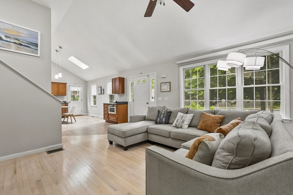 305 North Main Street Raynham, MA 02767 - Photo 6 of 38 a living room with furniture and a large window