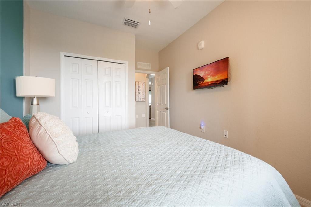 9572 Trevi Court, Unit 5045 Naples, FL 34113 - Photo 18 of 30 a view of a livingroom with wooden floor