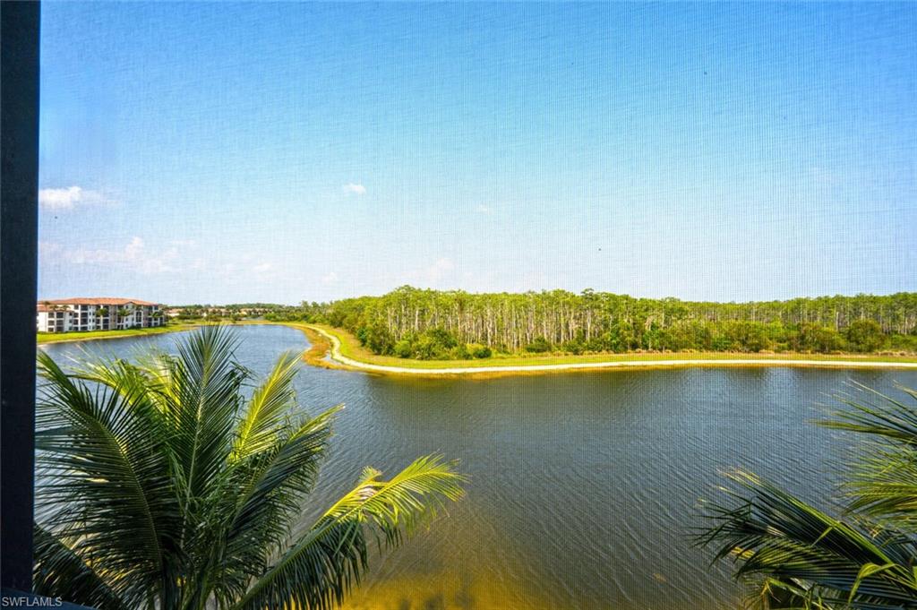 9572 Trevi Court, Unit 5045 Naples, FL 34113 - Photo 21 of 30 a view of an ocean and beach