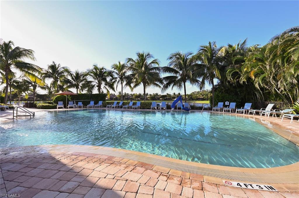9572 Trevi Court, Unit 5045 Naples, FL 34113 - Photo 28 of 30 a view of outdoor space with trees