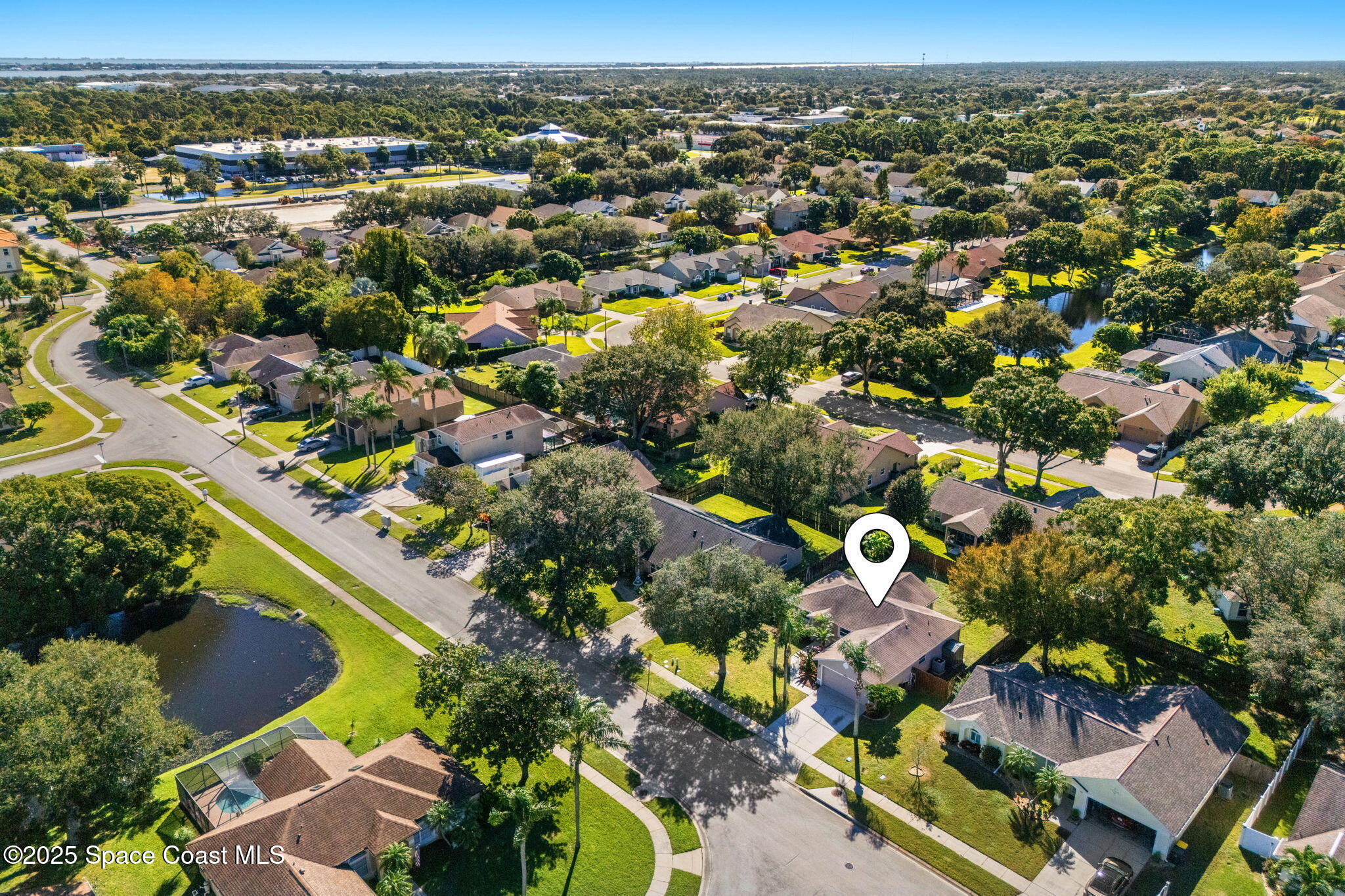 955 Sabal Grove Drive Rockledge, FL 32955 - Photo 34 of 39 an aerial view of residential houses with outdoor space