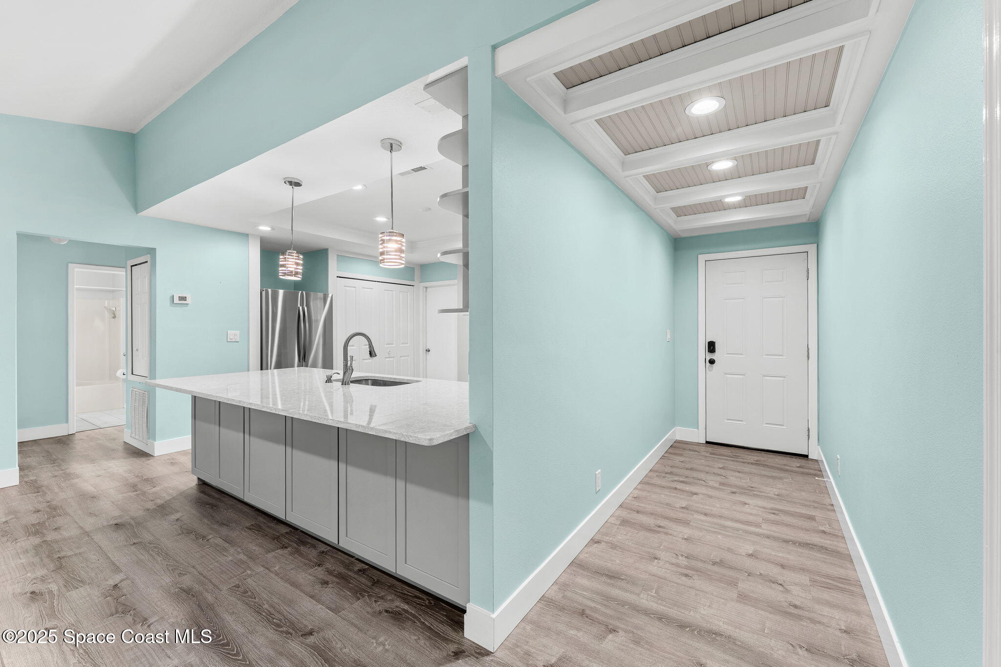 955 Sabal Grove Drive Rockledge, FL 32955 - Photo 4 of 39 a bathroom with a sink a mirror and a bathtub