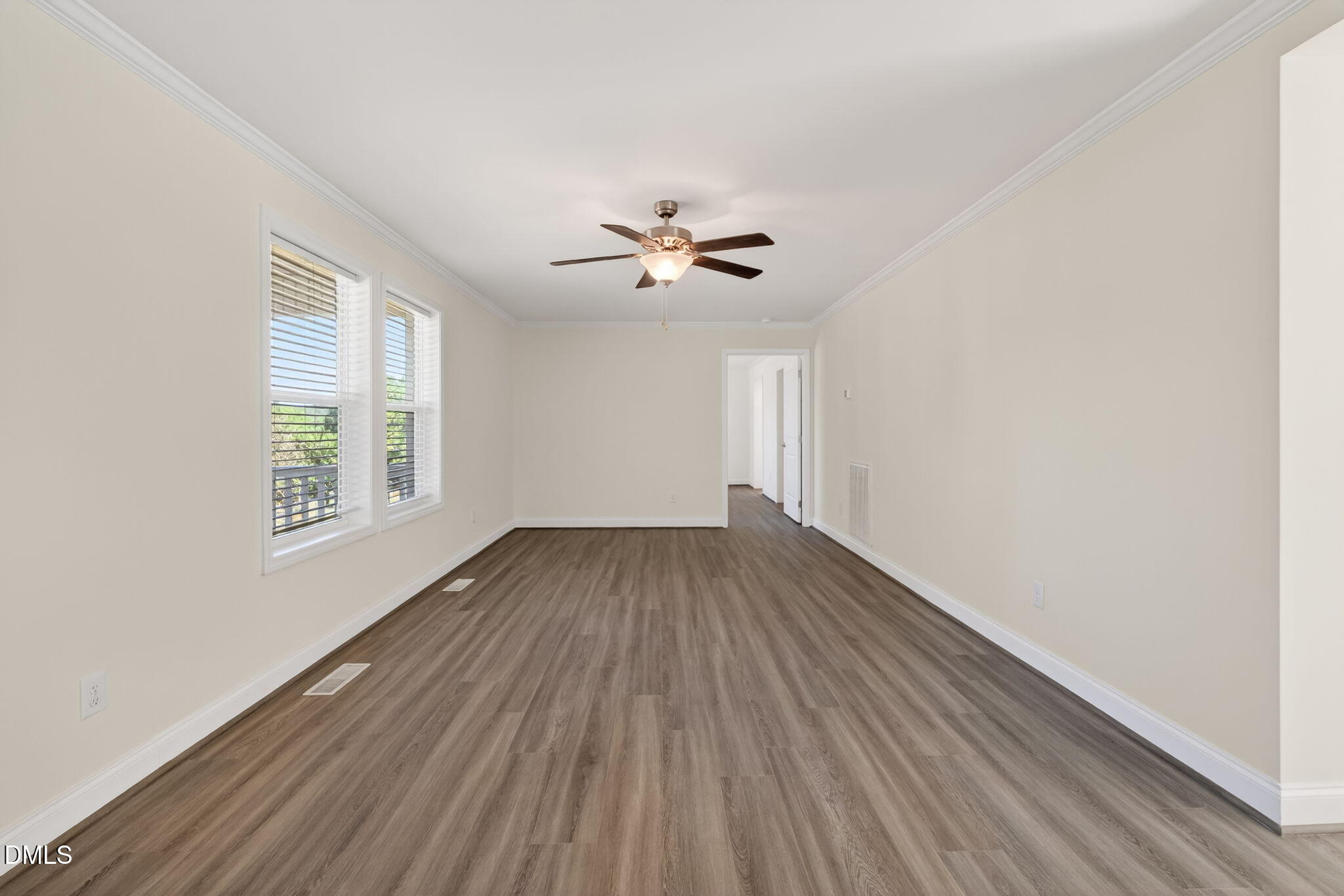 7122 Guess Road Hillsborough, NC 27278 - Photo 23 of 48 wooden floor in an empty room with a window