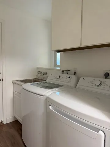 a utility room with dryer and washer