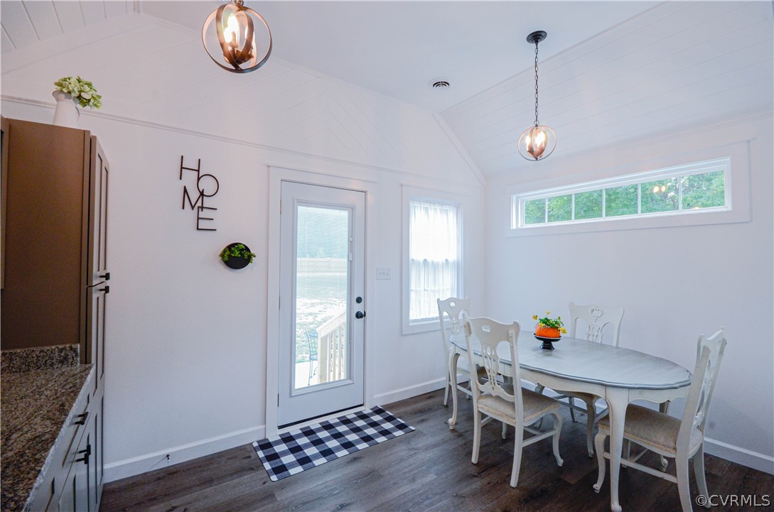 507 Old Bermuda Hundred Road Chester, VA 23836 - Photo 16 of 33 a view of a dining room with furniture and wooden floor