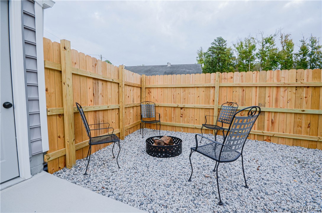 507 Old Bermuda Hundred Road Chester, VA 23836 - Photo 24 of 33 a backyard of a house with table and chairs