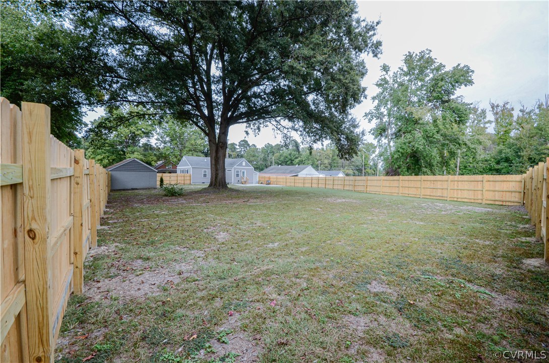 507 Old Bermuda Hundred Road Chester, VA 23836 - Photo 28 of 33 a view of a yard with large tree