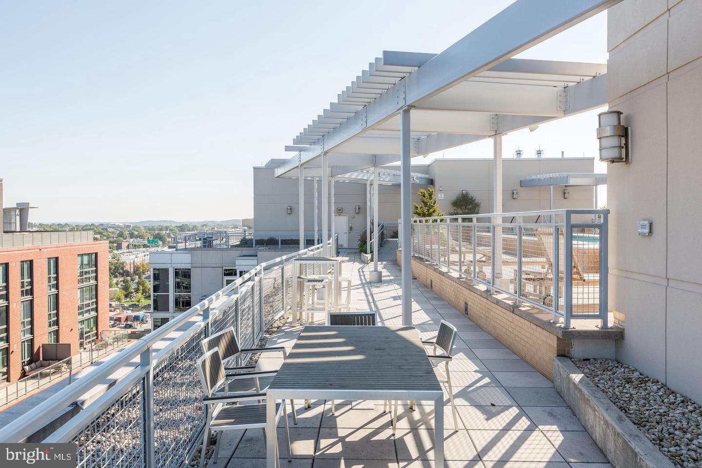 1025 First Street Southeast, Unit 716 Washington, DC 20003 - Photo 19 of 27 a view of balcony with wooden floor