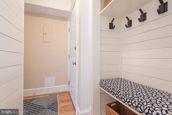a kitchen with granite countertop cabinets stainless steel appliances and a sink