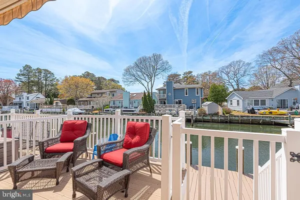 a view of a lake and trees