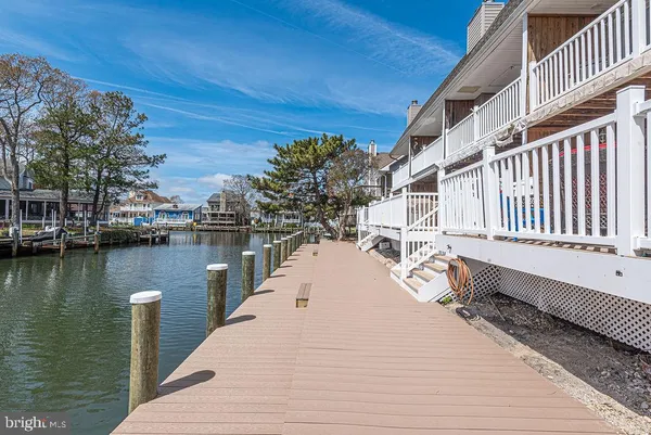 a front view of a wooden deck with a bench