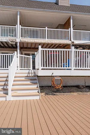 a view of a livingroom with furniture and a window