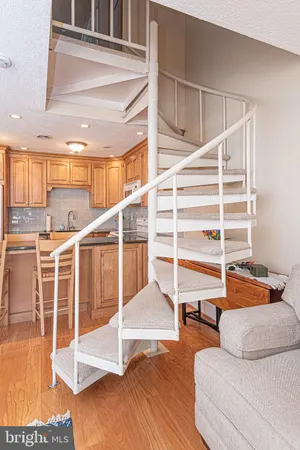 a view of a hallway with a room