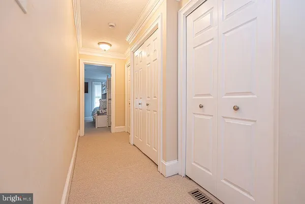 a bedroom with a bed and closet