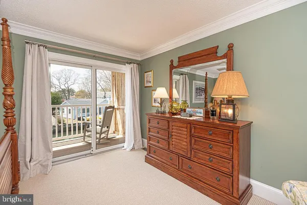 a view of balcony with furniture