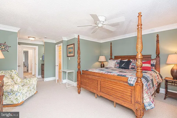 a view of a two chairs in the balcony