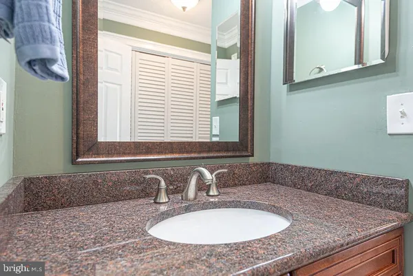 an aerial view of a house with outdoor space lake view and boat