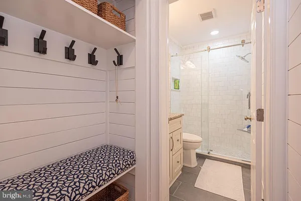 a bathroom with a sink and a shower