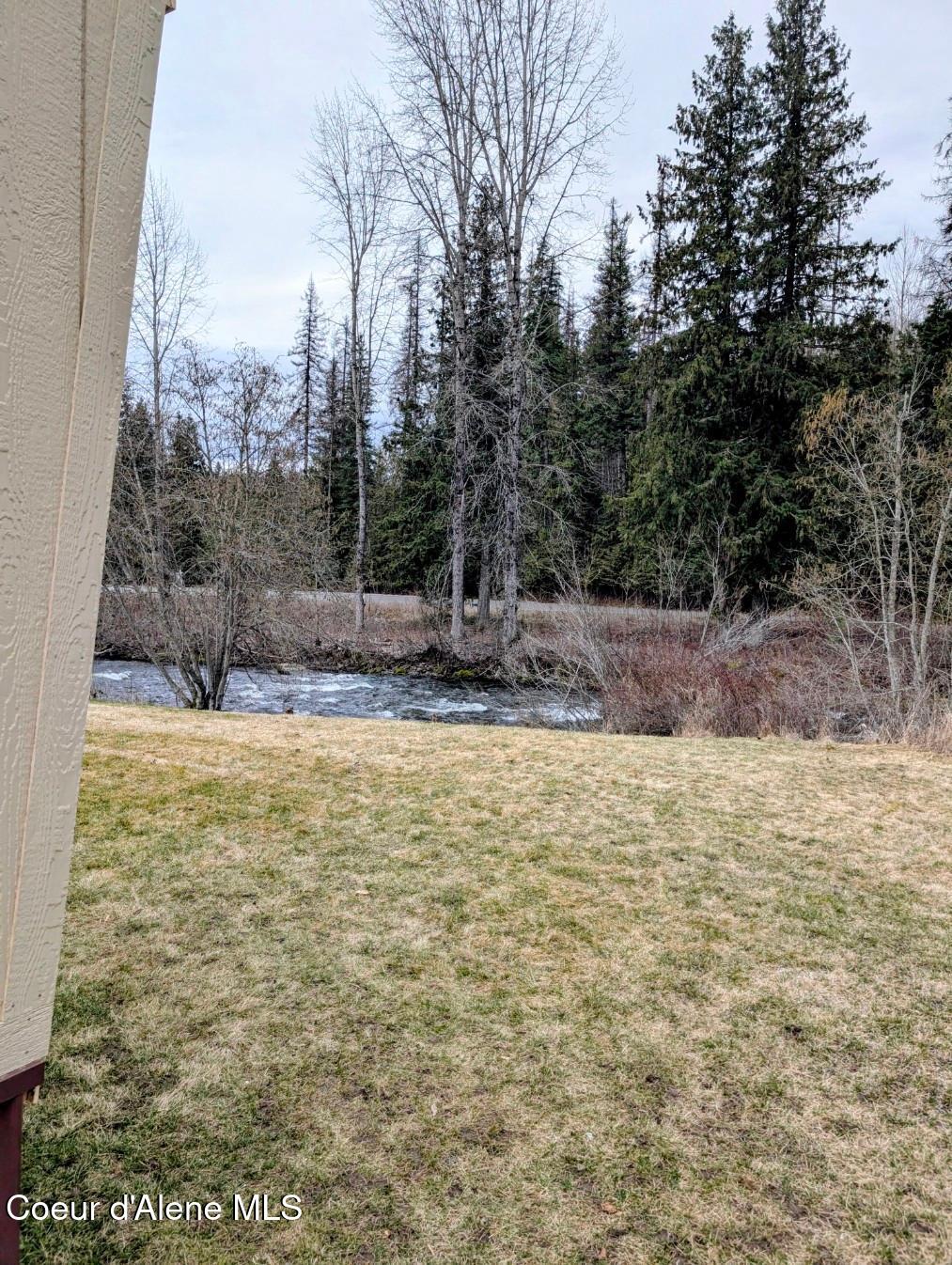 168 Wisdom Quest Road Bonners Ferry, ID 83805 - Photo 16 of 19 Creek is right out back!