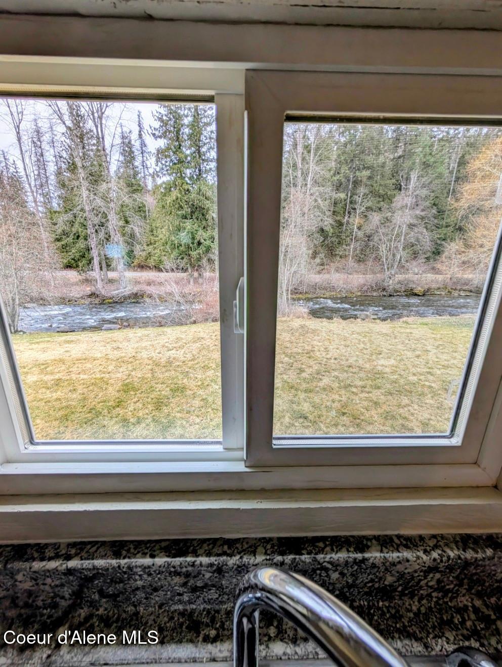 168 Wisdom Quest Road Bonners Ferry, ID 83805 - Photo 3 of 19 Creek right there..