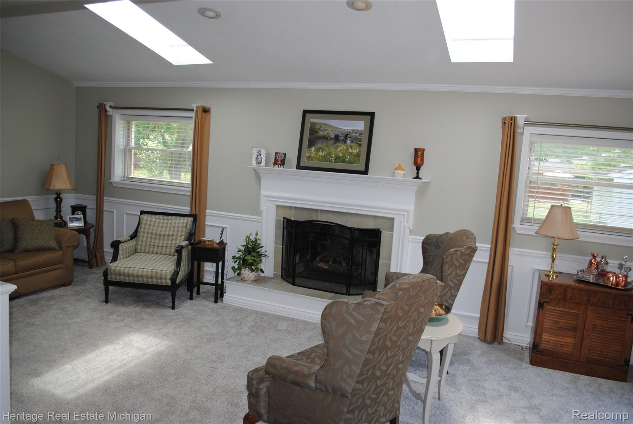 10240 Buno Road Brighton, MI 48114 - Photo 9 of 20 Gather around the fireplace on a cold winter evening and enjoy!