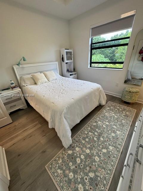 13241 Southwest 285th Street Homestead, FL 33033 - Photo 11 of 14 a bedroom with a bed and a window