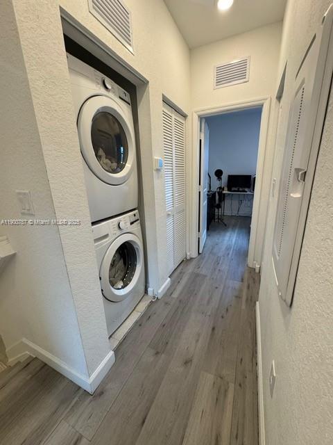 13241 Southwest 285th Street Homestead, FL 33033 - Photo 13 of 14 a view of a hallway with washer and dryer