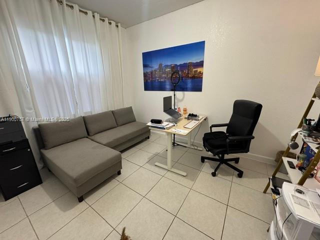 13241 Southwest 285th Street Homestead, FL 33033 - Photo 10 of 14 a living room with furniture and a air conditioner vent