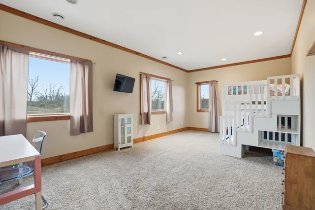 a view of livingroom with furniture and windows