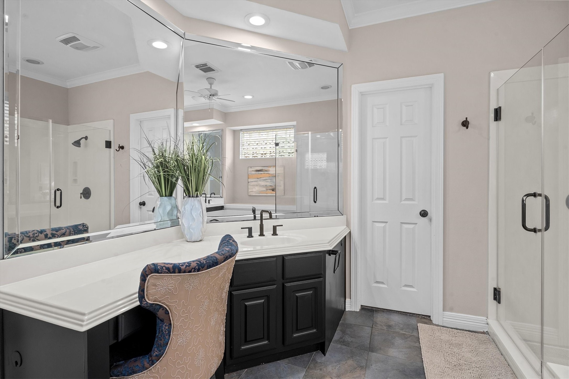14914 Codys Run Cypress, TX 77429 - Photo 18 of 44 a spacious bathroom with a double vanity sink a large mirror and shower