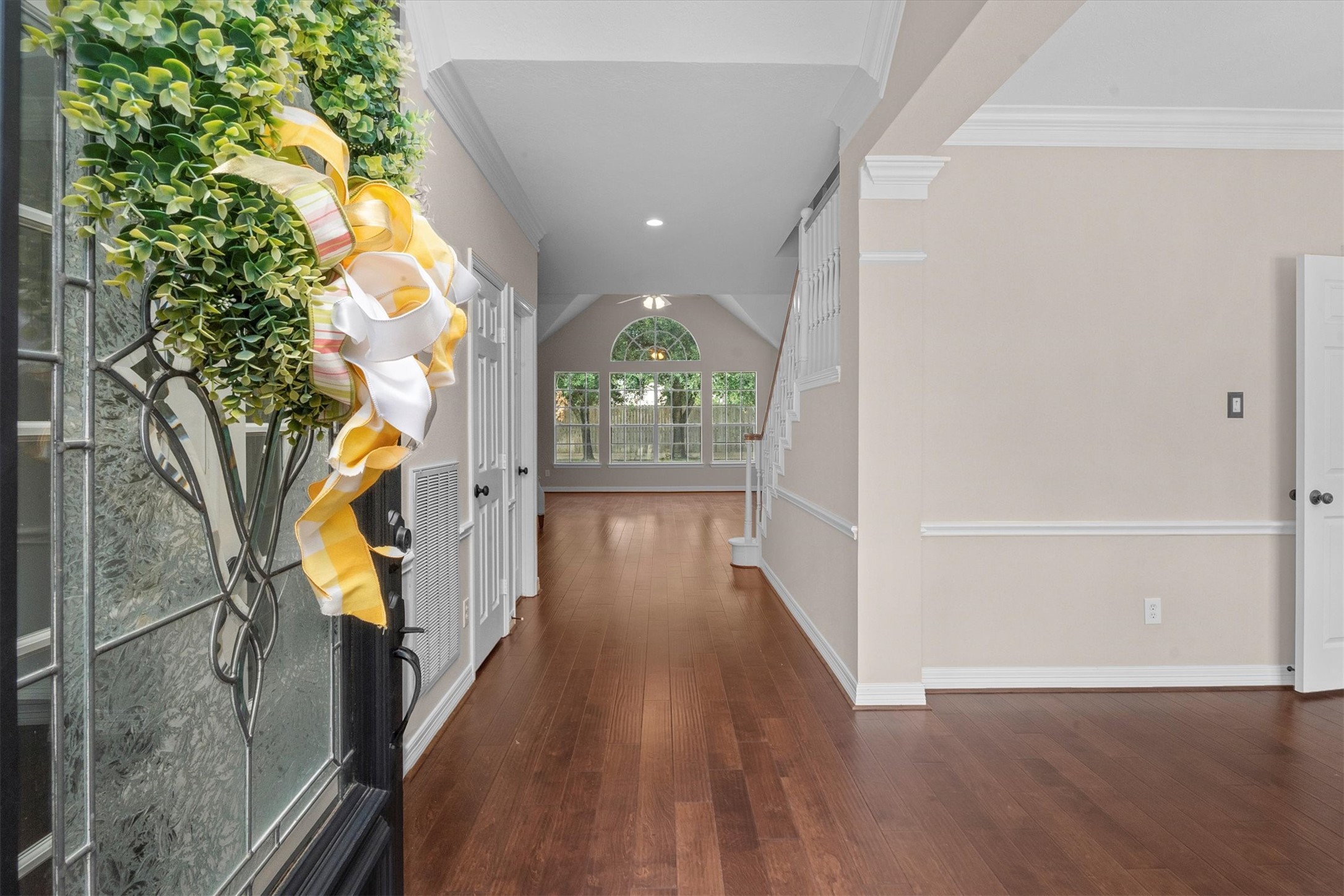14914 Codys Run Cypress, TX 77429 - Photo 3 of 44 a view of entryway with wooden floor