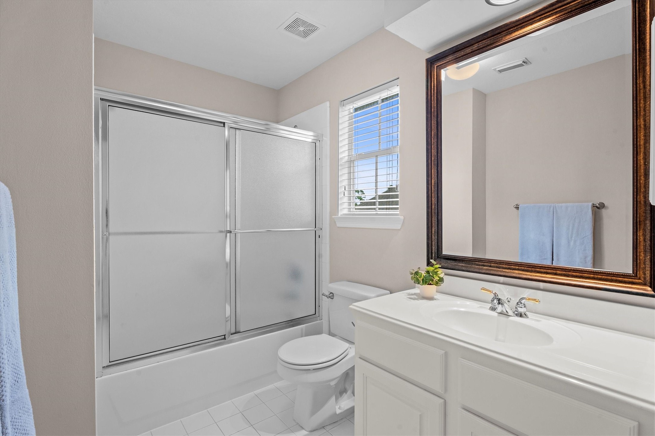 14914 Codys Run Cypress, TX 77429 - Photo 31 of 44 a bathroom with a sink a toilet and shower