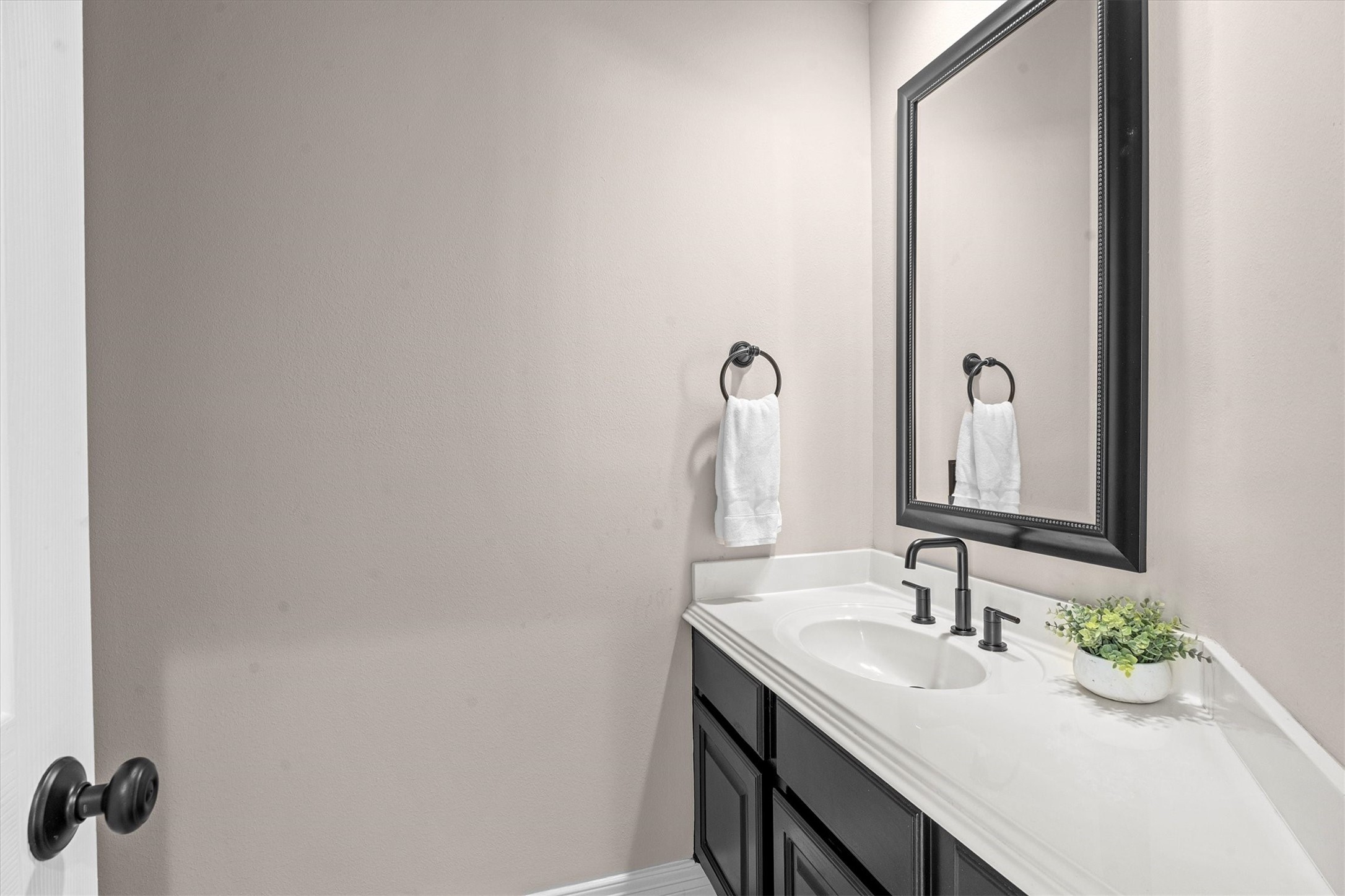 14914 Codys Run Cypress, TX 77429 - Photo 32 of 44 a bathroom with a sink and a mirror