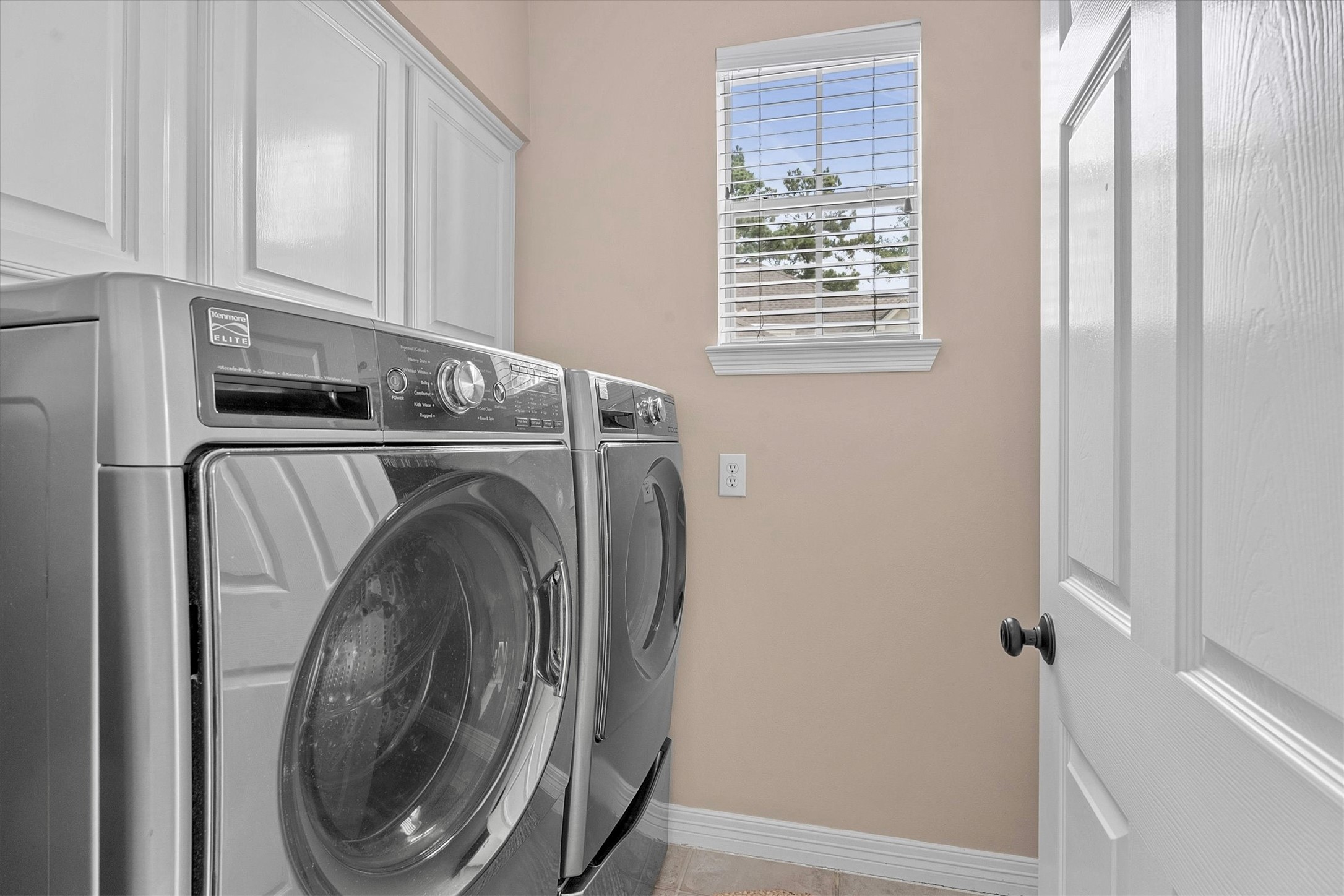 14914 Codys Run Cypress, TX 77429 - Photo 33 of 44 a utility room with dryer and washer