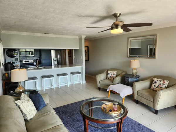 a bedroom with a bed and a view of bathroom