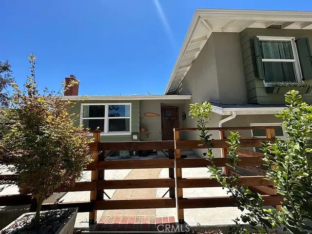 a front view of a house with street