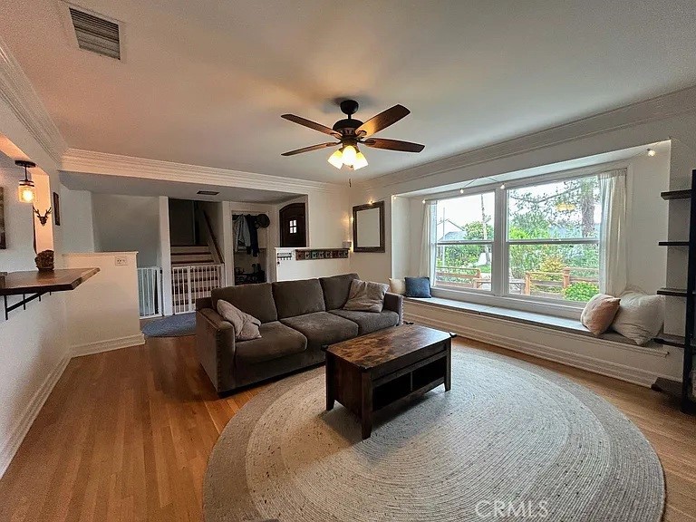 3816 Hartung Court Newbury Park, CA 91320 - Photo 4 of 19 a living room with furniture and a large window