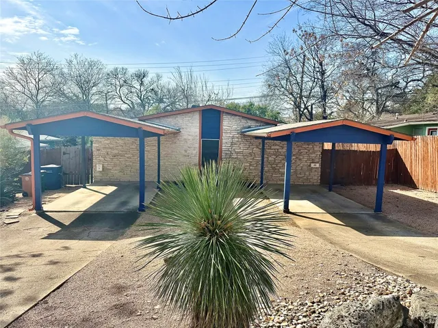 a house with trees in front of it