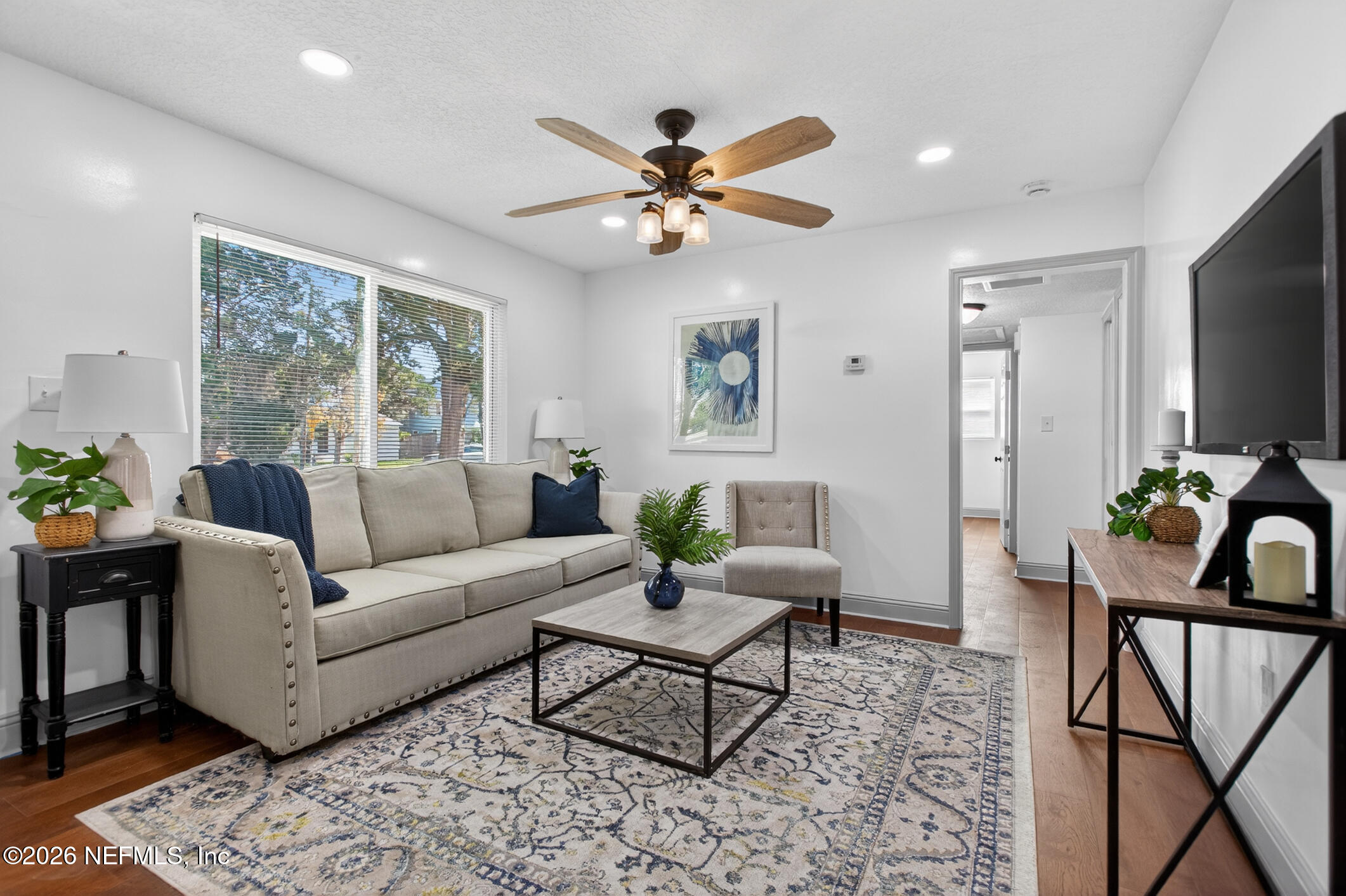 113 Menendez Road St. Augustine, FL 32080 - Photo 13 of 71 a living room with furniture a desk and a window