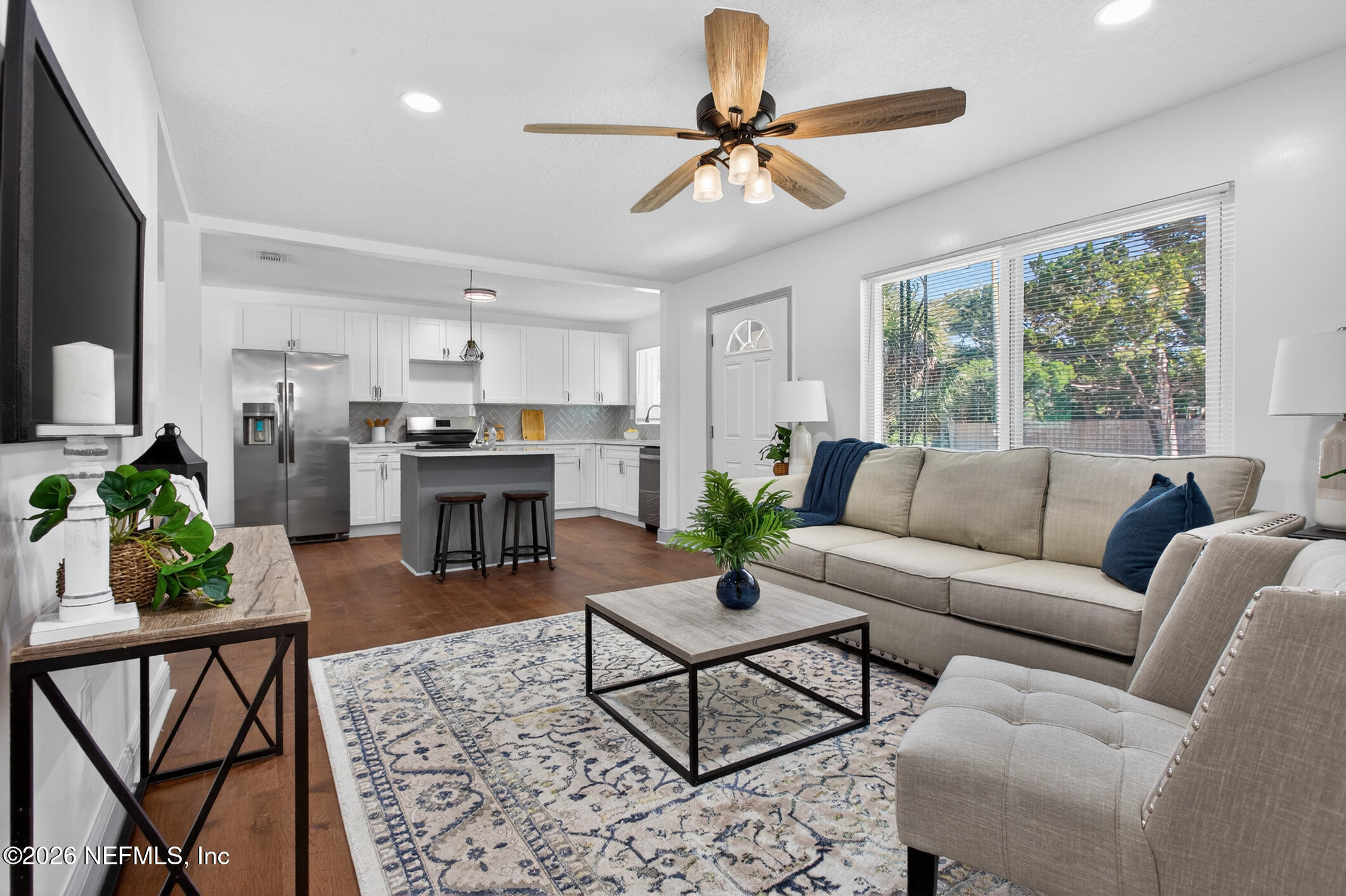 113 Menendez Road St. Augustine, FL 32080 - Photo 14 of 71 a living room with furniture a window and a fireplace
