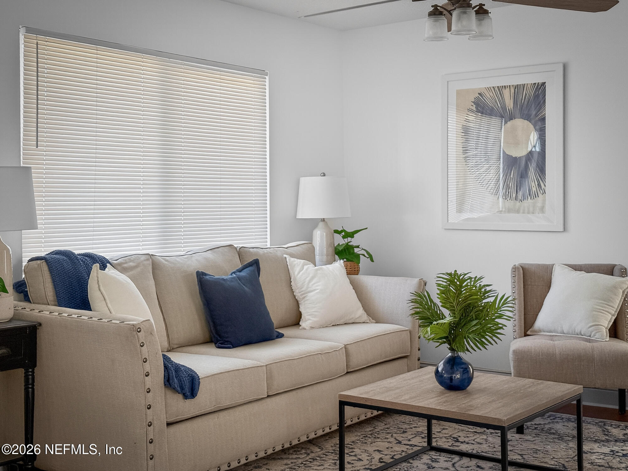 113 Menendez Road St. Augustine, FL 32080 - Photo 17 of 71 a living room with furniture and a potted plant
